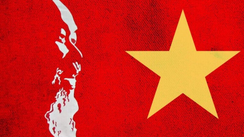 Mẫu background tối giản, tinh tế với hình Bác Hồ và lá cờ đỏ sao vàng