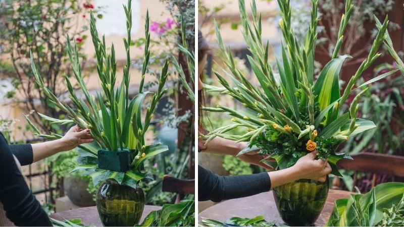 Thêm lá để hoàn thiện bình hoa Thêm lá để hoàn thiện bình hoa