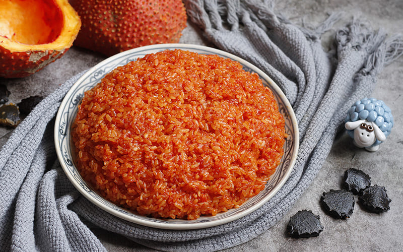 Xôi gấc – Màu đỏ mang lại vận may