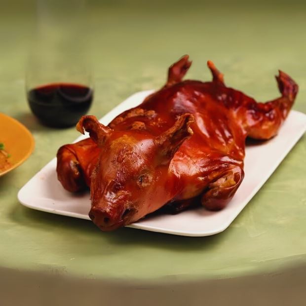 Cách làm heo sữa quay nguyên con bằng lò nướng béo giòn ngon miệng