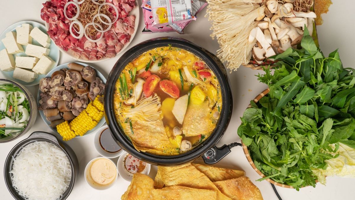 Lẩu đuôi bò ăn với rau gì