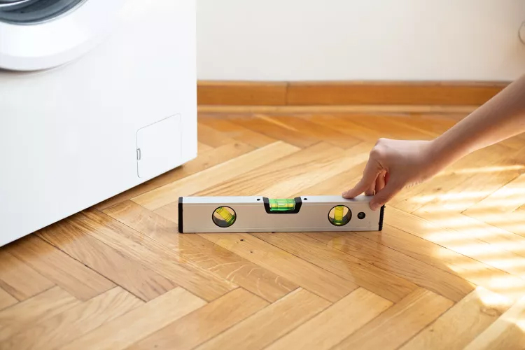 Máy giặt đặt ở vị trí kênh, nghiêng hoặc không bằng phẳng làm lồng quay lệch trục, gây lỗi E3