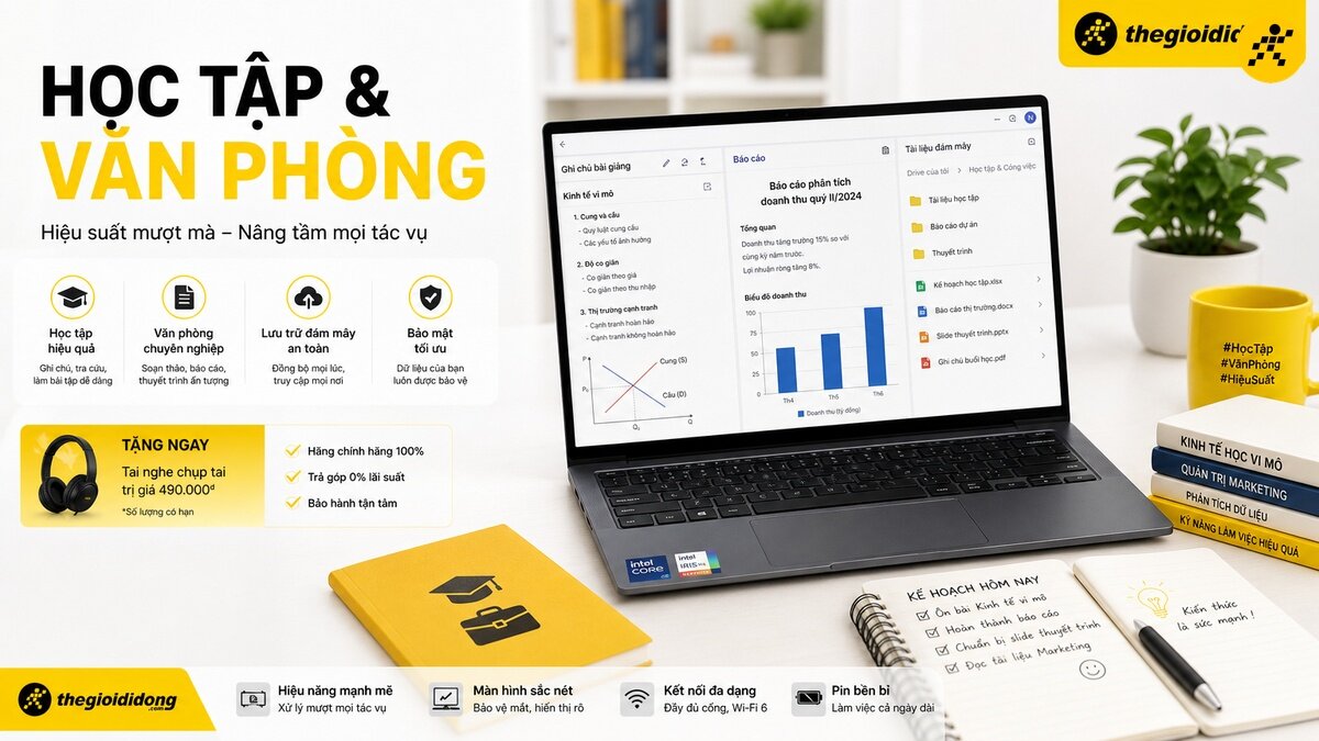 Laptop màu xám đang mở trên bàn làm việc, màn hình hiển thị báo cáo kinh doanh và biểu đồ. Bên cạnh là chồng sách, cốc vàng và sổ tay.