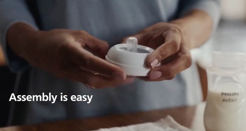 Luồn núm ty từ dưới lên trên cổ bình