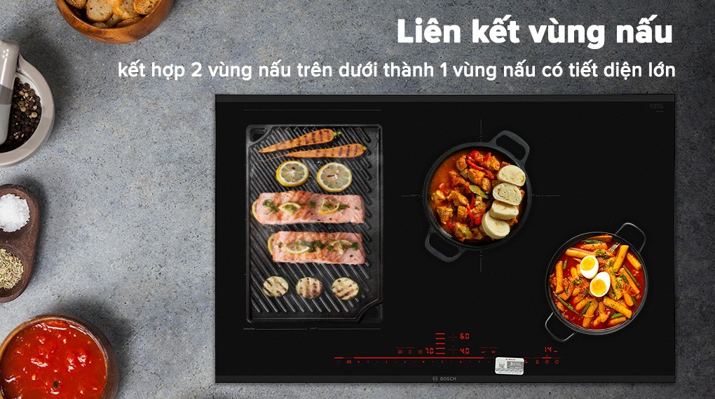 Bếp từ 4 vùng nấu lắp âm Bosch PXE875DC1E có khả năng liên kết vùng nấu rất tiện lợi