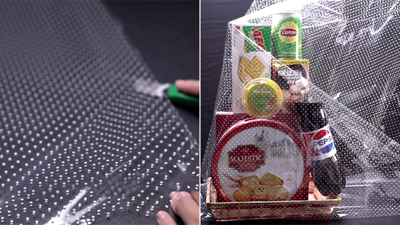 Bước 1: Quấn giấy kiếng quanh giỏ quà Bước 1: Quấn giấy kiếng quanh giỏ quà