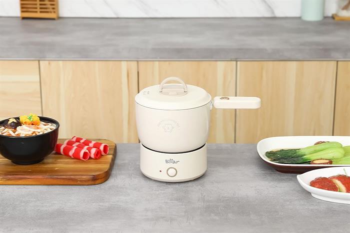 Nồi lẩu điện Bear MC-4H12H 1.2 lít Màu Màu be